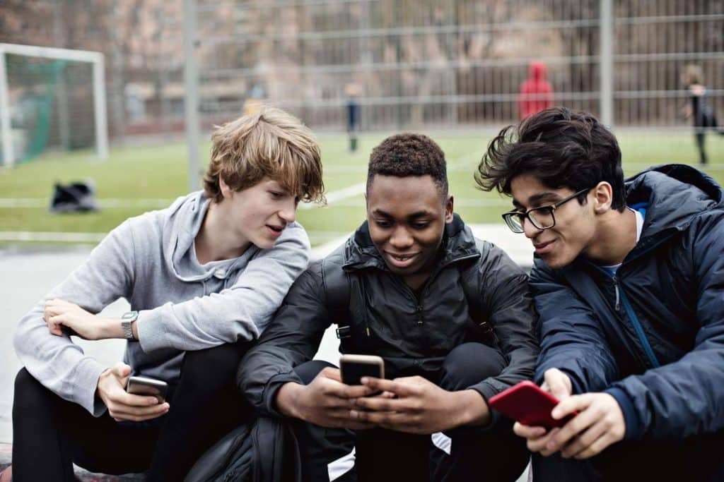 Friends looking at phone