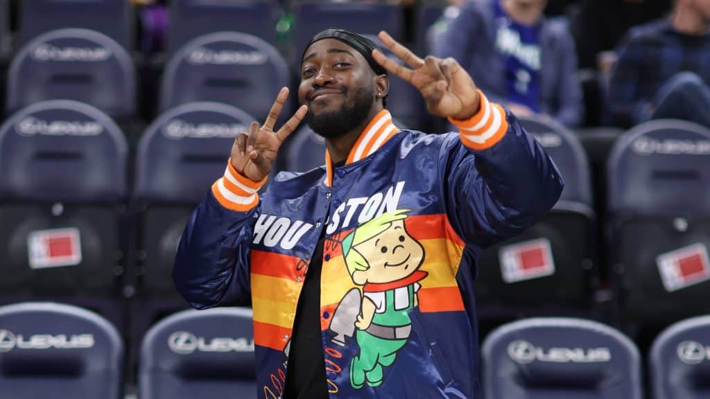 JiDion posing with peace signs at NBA