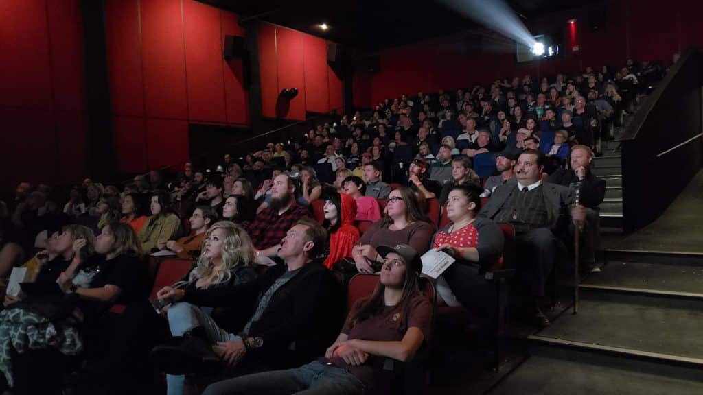 People Watching A Movie At A Cinema