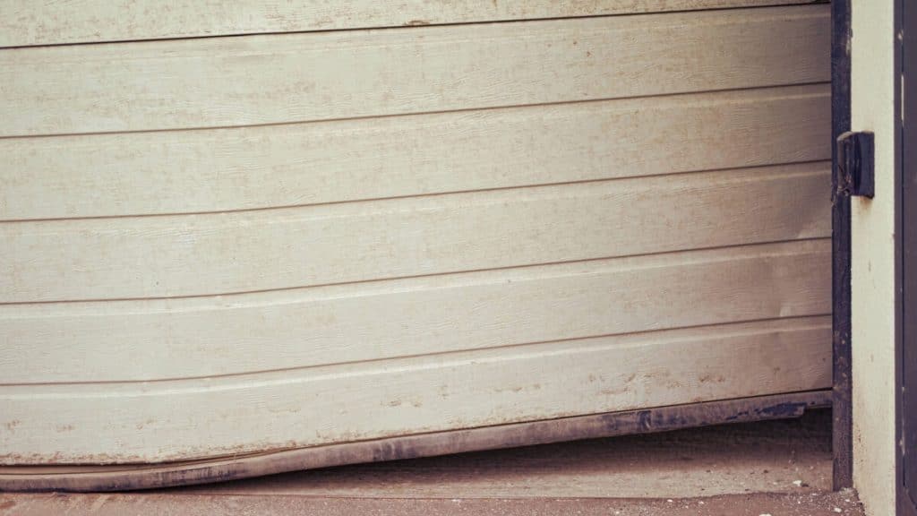 Damaged Garage Door Panels Repair Options and When to Consider Replacement