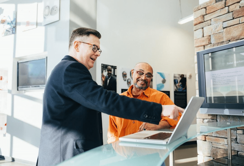 Two professionals using an account planning software tool to streamline sales operations and enhance strategic decision-making