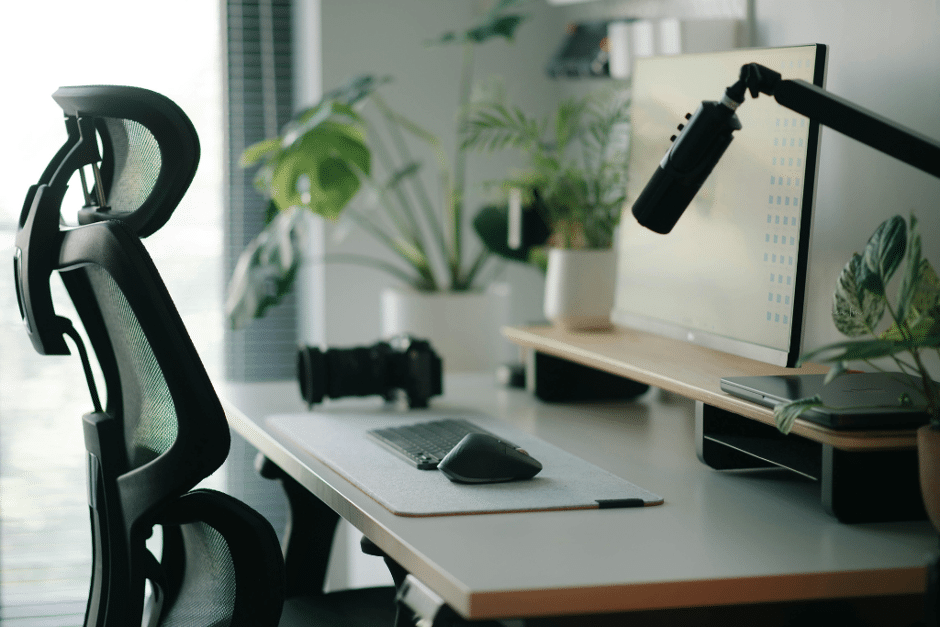 ergonomic-workstation-setup-with-chair-monitor-keyboard-and-desk-accessories-in-natural-light