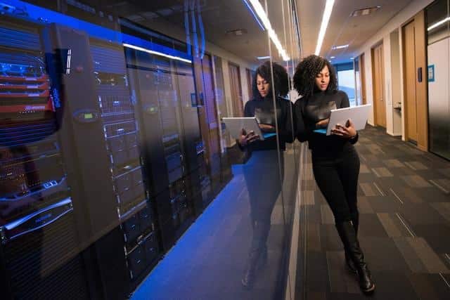 A startup founder reviewing cloud hosting options on a laptop symbolizing smart hosting decisions