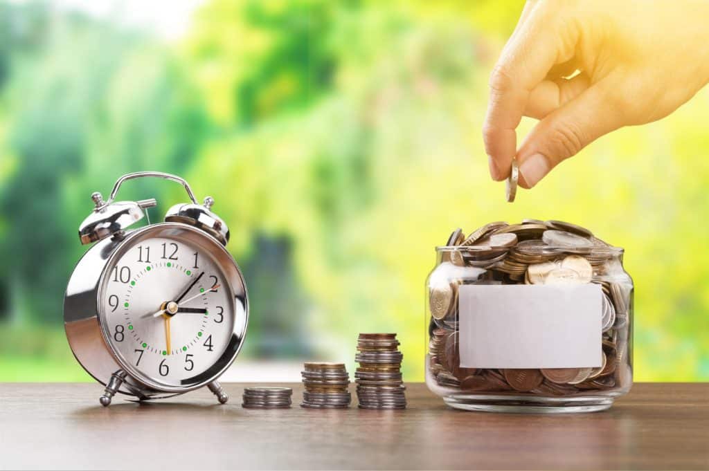 Stack of coins and bank passbook representing choosing the best fixed deposit for high returns