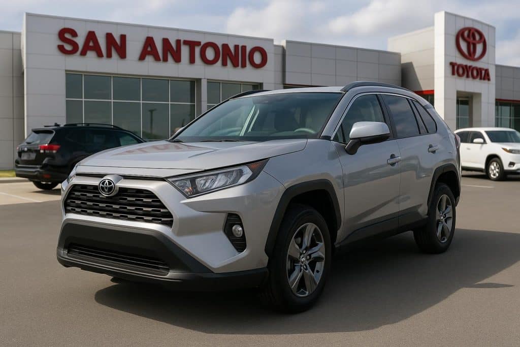 Row of used Toyota RAV4 SUVs for sale at a dealership in San Antonio highlighting key features
