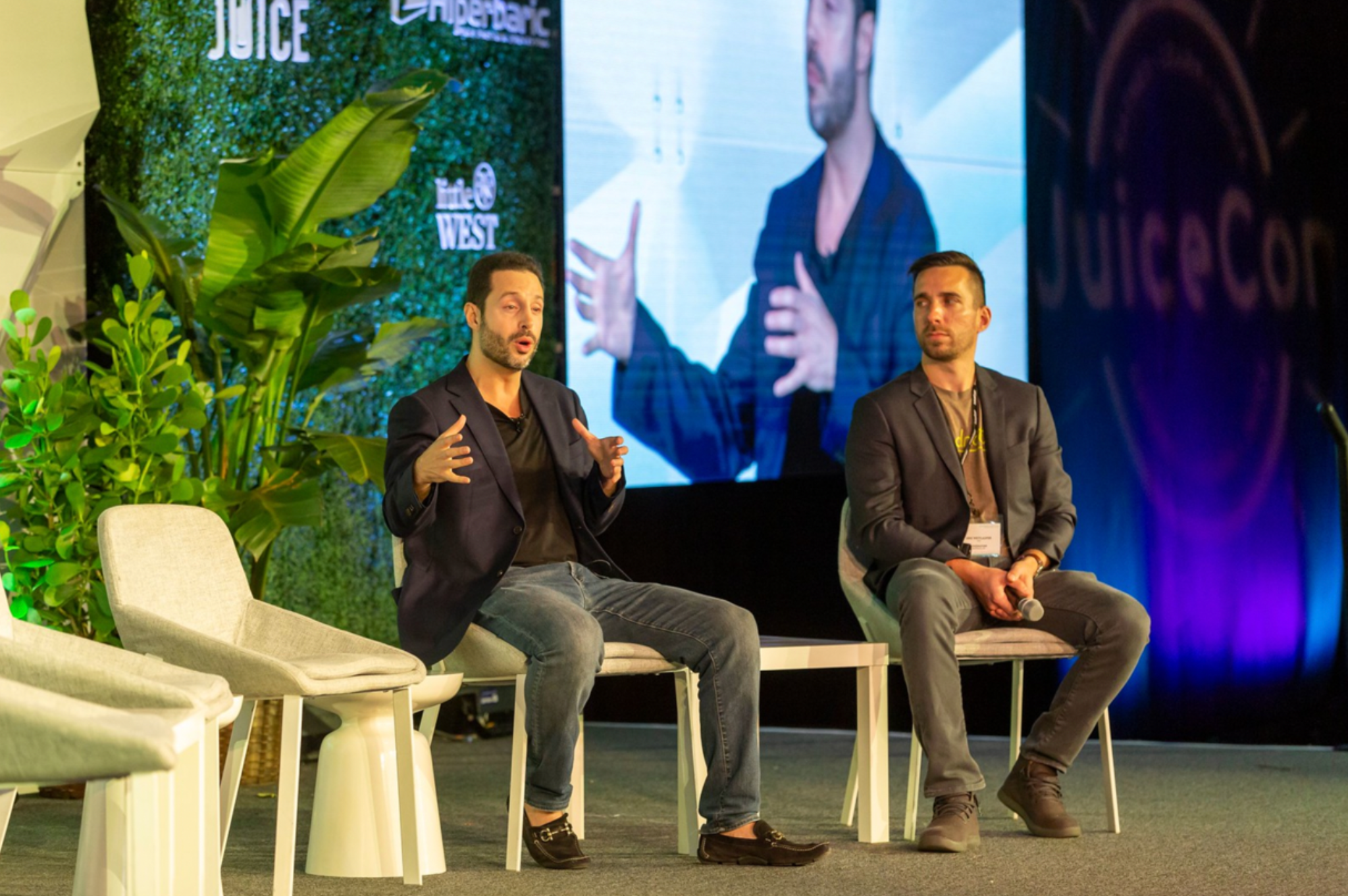 Ross Franklin speaking on stage at franchise and wellness industry conference