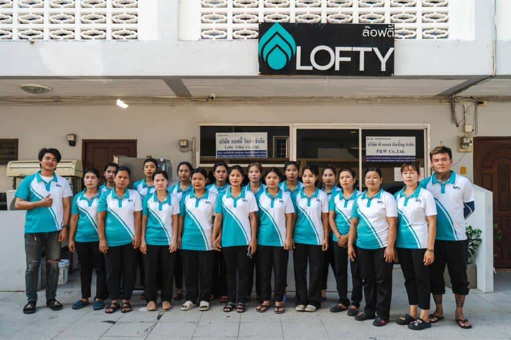 Property Maintenance Service - Lofty Phuket - housekeeping and maintenance team in branded uniforms outside the office