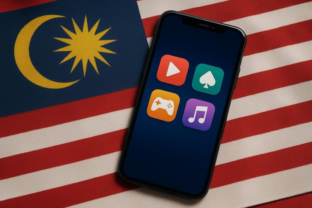 Mobile entertainment app icons displayed on a smartphone, representing trends in Malaysia