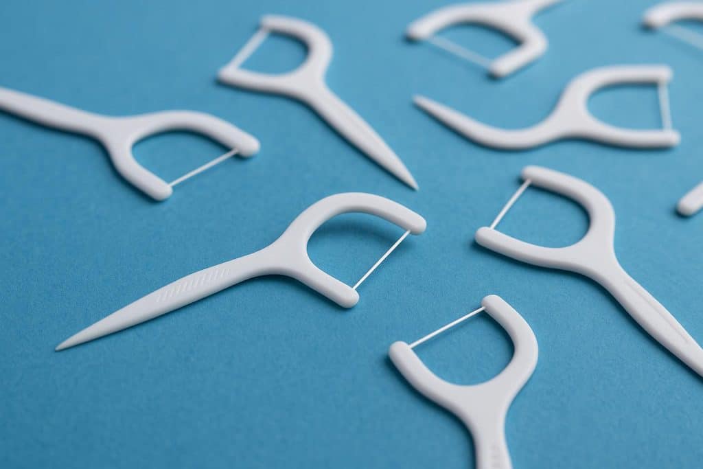 What Dental Clinics and Retailers Should Look for in Floss Pick Quality Assortment of dental floss picks highlighting features for dental clinic and retailer quality standards